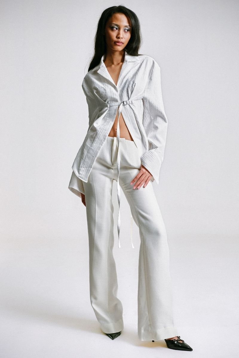 Sean Sheila tailored shirt with belt opening, featuring a front view of the stylish, fitted shirt in the image.