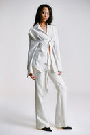 Sean Sheila tailored shirt with belt opening, featuring a sleek design and side view showing the fitted style and stylish details.