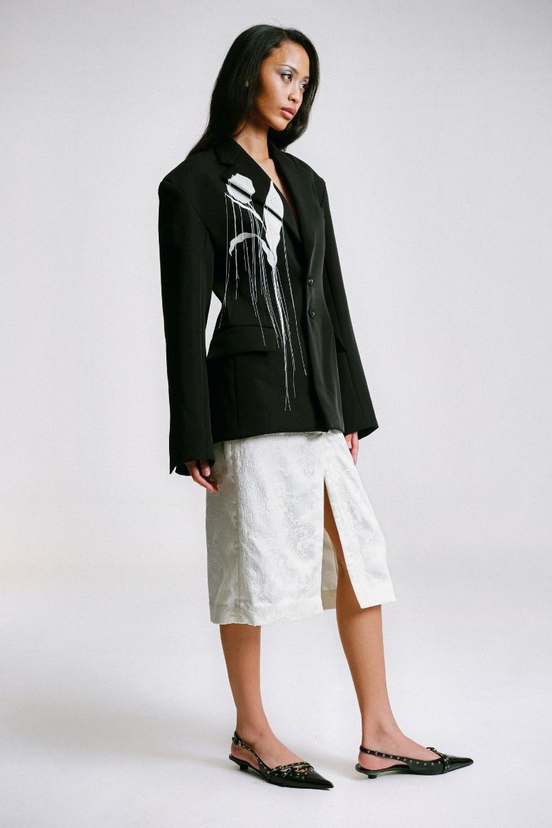Side view of Sean Sheila embroidered tailored jacket showing detailed embroidery and sleek fit on a model.