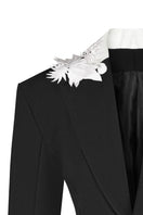 Black tailored suit jacket with embroidered collar by Sean Sheila, featuring sleek design and elegant craftsmanship.