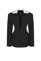 Black tailored Sean Sheila suit jacket with embroidered collar, front view showcasing sleek design and fine stitching.
