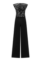 Back view of a Lili Blanc asymmetric sleeveless jumpsuit featuring stylish design and comfortable fit.