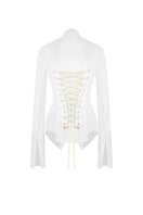 White kebaya shirt with corset detail from Sean Sheila, shown from the back with intricate stitching and fitted design.