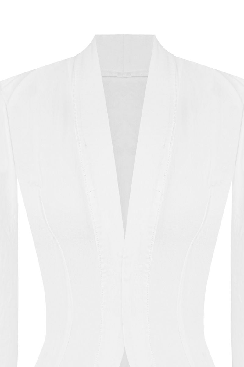 White Sean Sheila kebaya shirt with elegant corset detail, showcasing intricate design and traditional-inspired fashion.