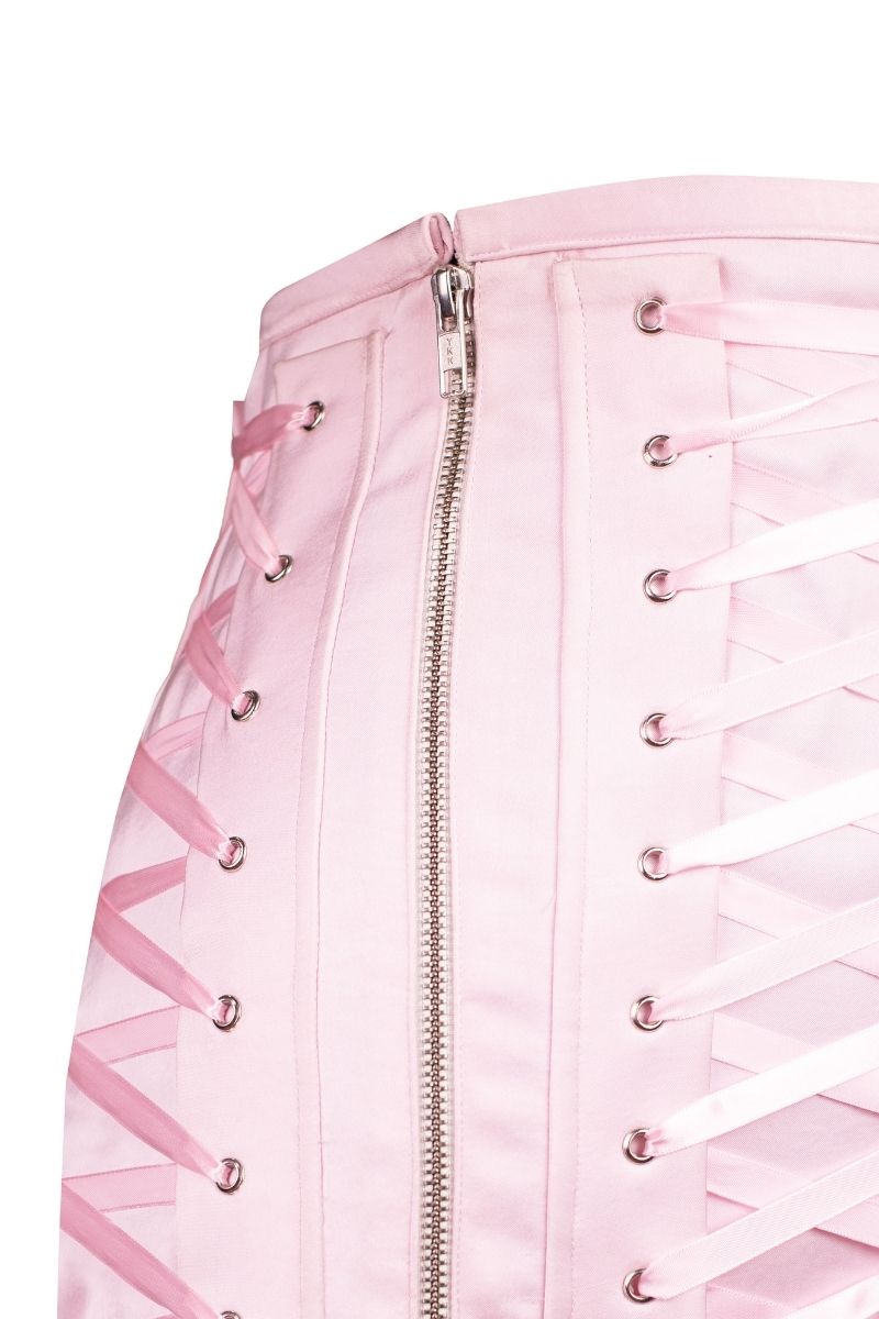 Pink corseted mini skirt from Sean Sheila, featuring a fitted design and stylish detailing, perfect for a trendy outfit.