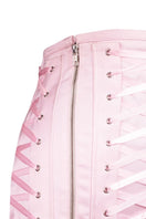 Pink corseted mini skirt by Sean Sheila, detailed close-up showcasing the fitted design and stylish fabric.