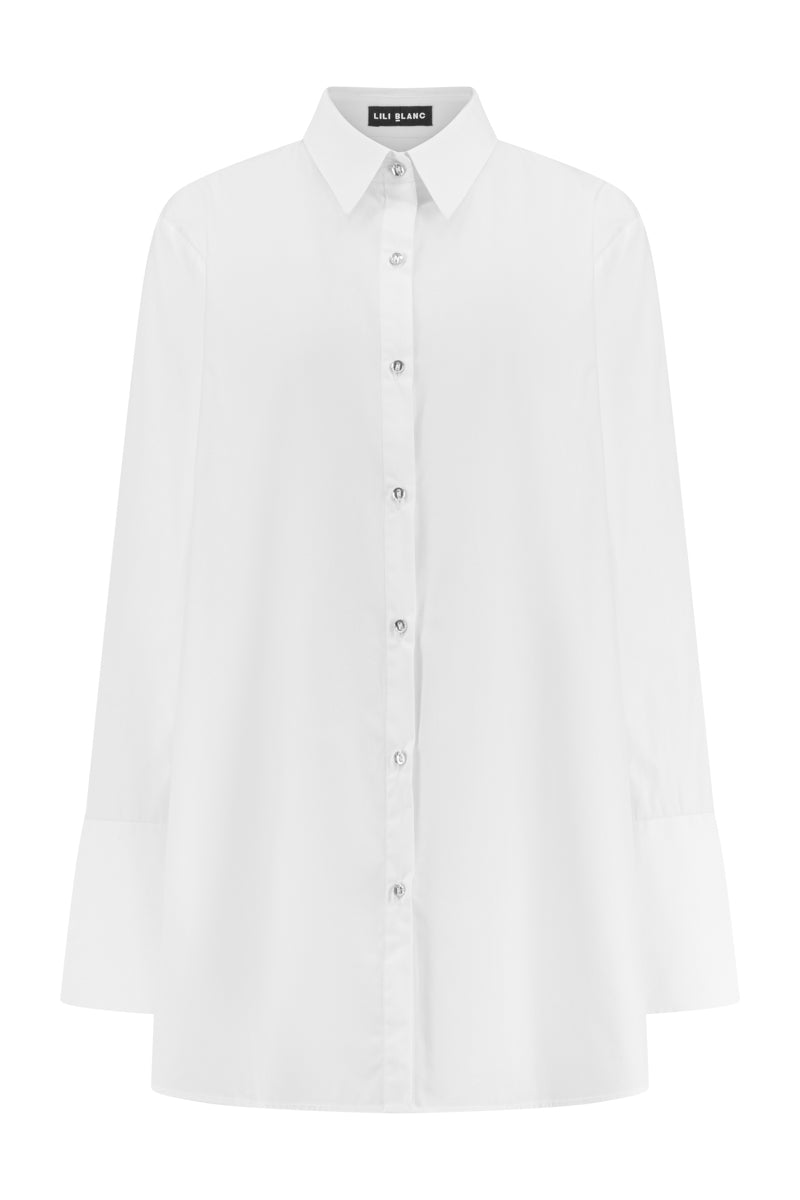 Light beige oversized cotton shirt by Lili Blanc with a relaxed fit, front button closure, and classic collar, shown from the front.