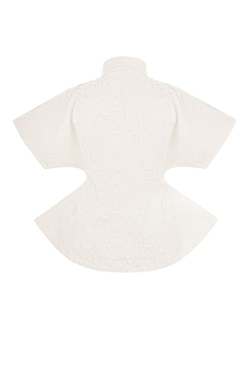 Sean Sheila Signature Embroidered Kimono tops shown from the back with intricate embroidery and flowing fabric.