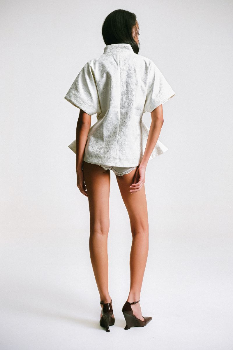 Sean Sheila Signature Embroidered Kimono top with intricate embroidery, flowing fabric, and elegant design shown from the back.