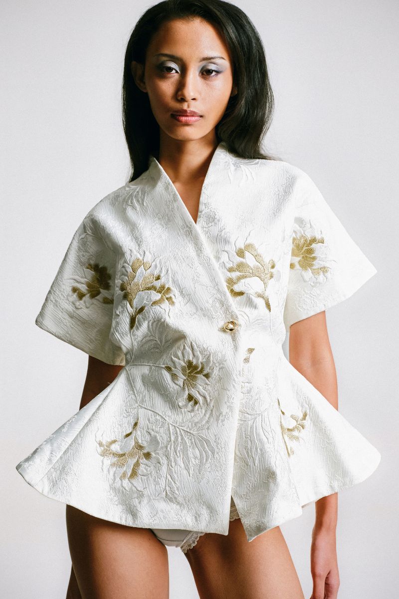 Embroidered kimono top by Sean Sheila with intricate needlework, flowing fabric, and a stylish, relaxed fit for casual wear.