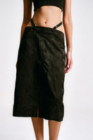 Black midi pencil skirt with stencil detail from Sean Sheila, showcasing a fitted silhouette and stylish pattern design.