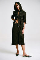 Black Sean Sheila pencil midi skirt with stencil detail, showcasing a fitted waist and sleek silhouette in the front view.