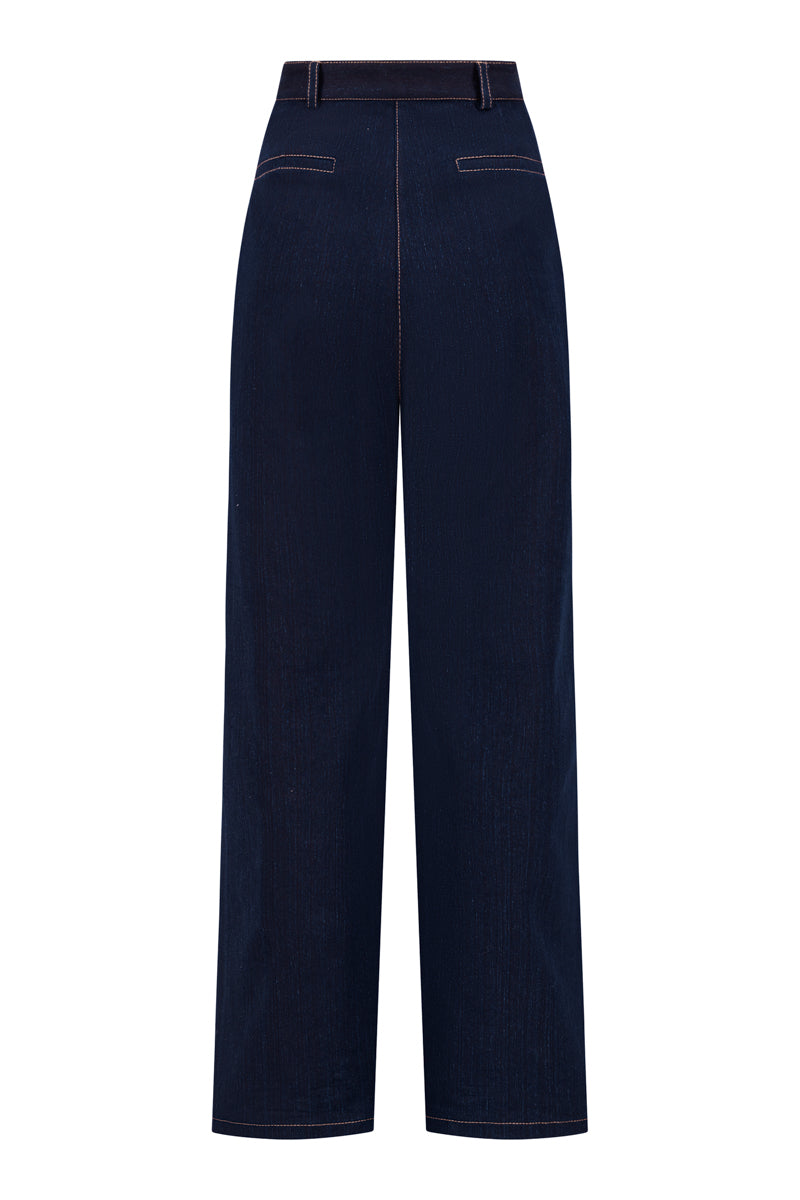 Back view of Lili Blanc tailored straight-leg denim trousers showing classic blue jeans fit and stitching details.