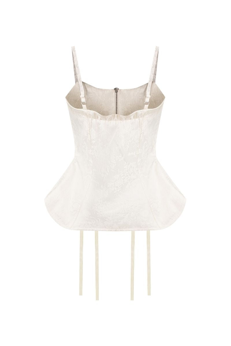 White deconstructed corset top by Sean Sheila, shown from the back with structured design and adjustable straps.