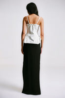 Back view of Sean Sheila deconstructed white corset top, showcasing intricate details and structured design.