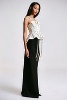 Side view of Sean Sheila white deconstructed corset top, showcasing its unique design and detailed construction.