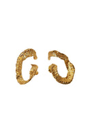 Sara & Flora Trozo de Sol hoops earrings featuring sun-shaped gold-tone design.
