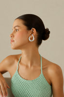 Sara & Flora TROZO DE LUNA hoops earrings with crescent moon design, gold-tone metal, and lightweight, stylish jewelry.