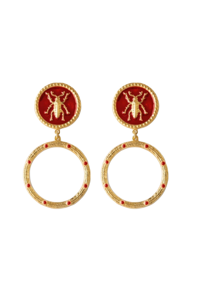 Red bug earrings with hoop design by Natia x Lako, featuring vibrant red bug charms hanging from gold hoops.