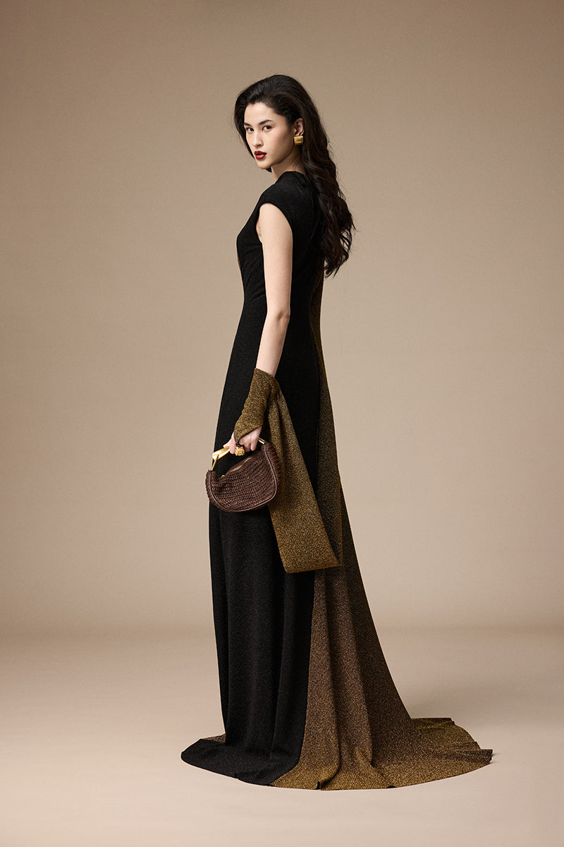 Jenny K Tran Stardust dress in black and gold glitter, elegant gown with shimmering fabric and stylish design.