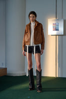 Brown Stella leather jacket by Lorena Saravia, stylish women's jacket with a sleek design and textured leather finish.