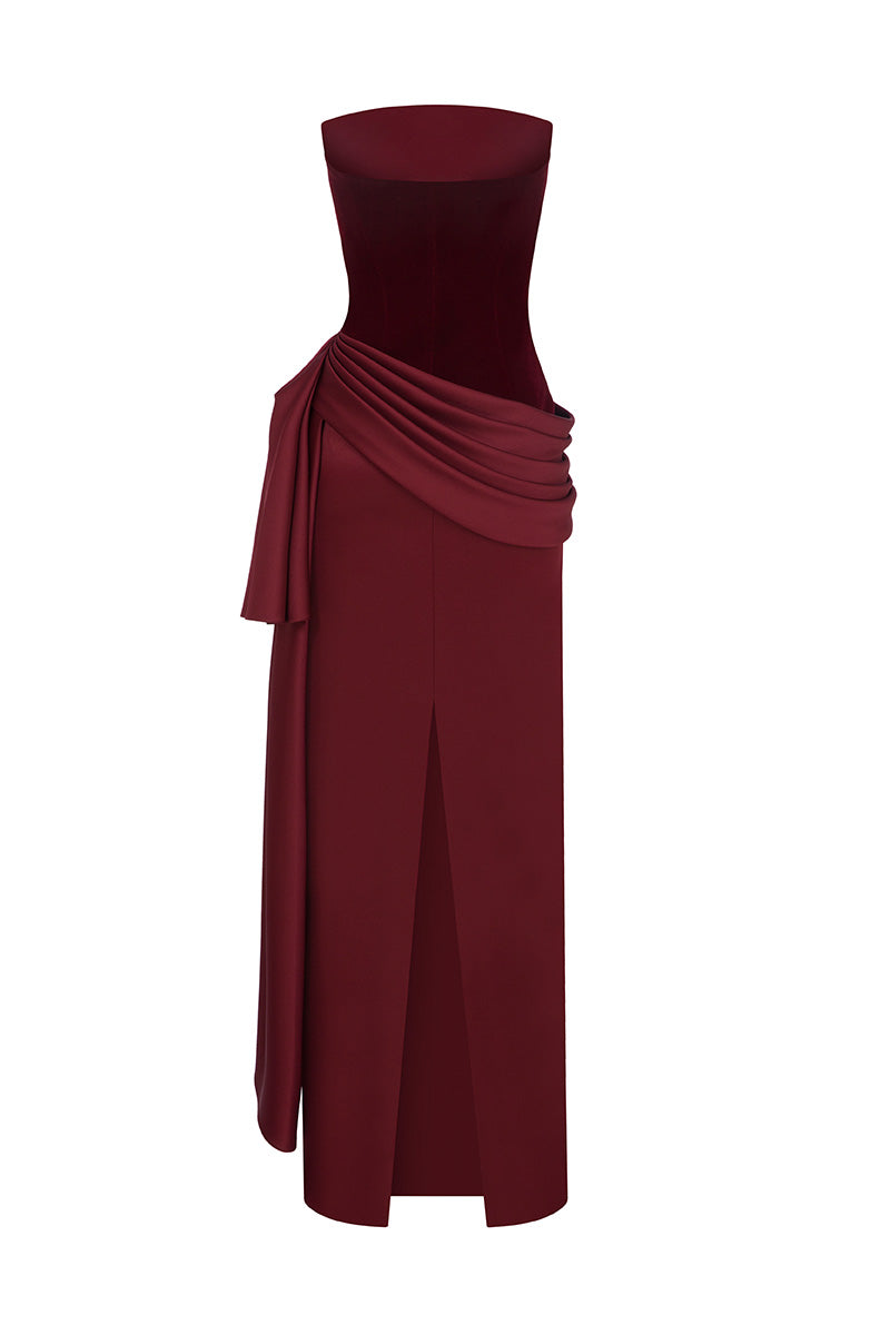 Deep burgundy and wine SULE maxi dress by MOON / HAKAN YILDIRIM, shown from the back with flowing fabric and elegant design.