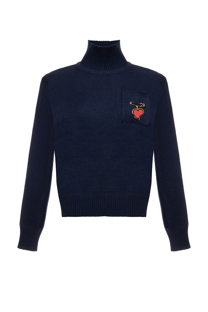 Liya sweater featuring a heart pendant, cozy knit fabric, long sleeves, and stylish design perfect for casual wear.
