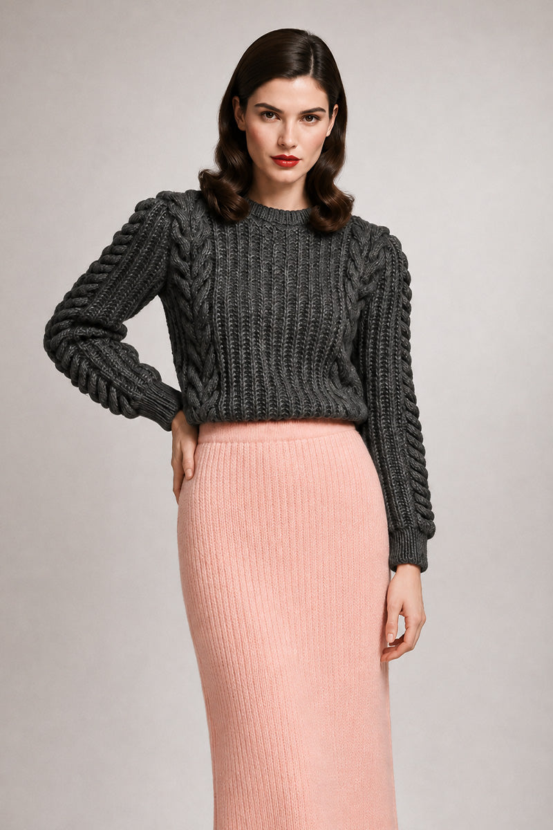 Liya grey heritage sweater with a classic knit design, featuring ribbed cuffs and a relaxed fit for cozy style.