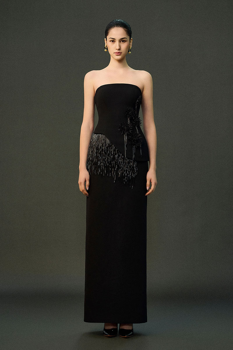 Black MAYSA gown by EEGEN STUDIO, elegant full-length dress with smooth fabric and stylish design, perfect for formal occasions.