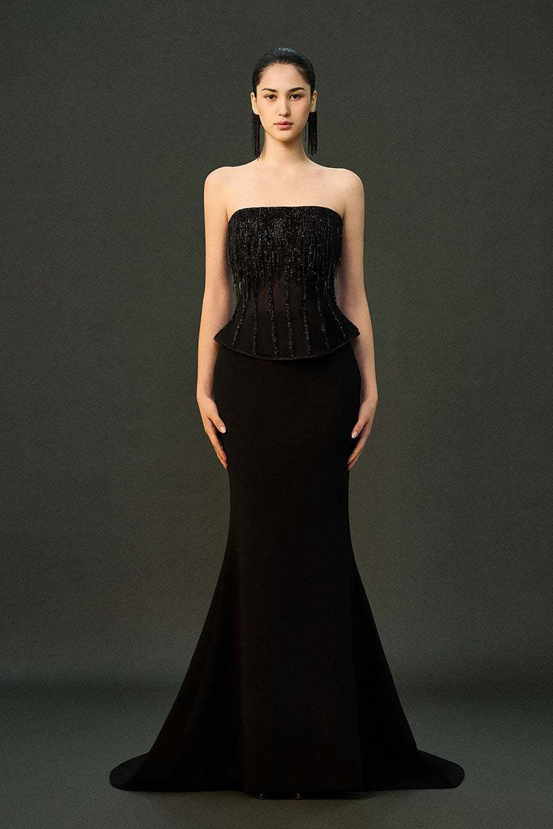Black Reema Set gown by EEGEN STUDIO with intricate embroidery and flowing fabric, displayed on a model.