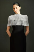 Elegant black sable gown by EEGEN STUDIO, featuring flowing fabric and sophisticated design, perfect for formal occasions.