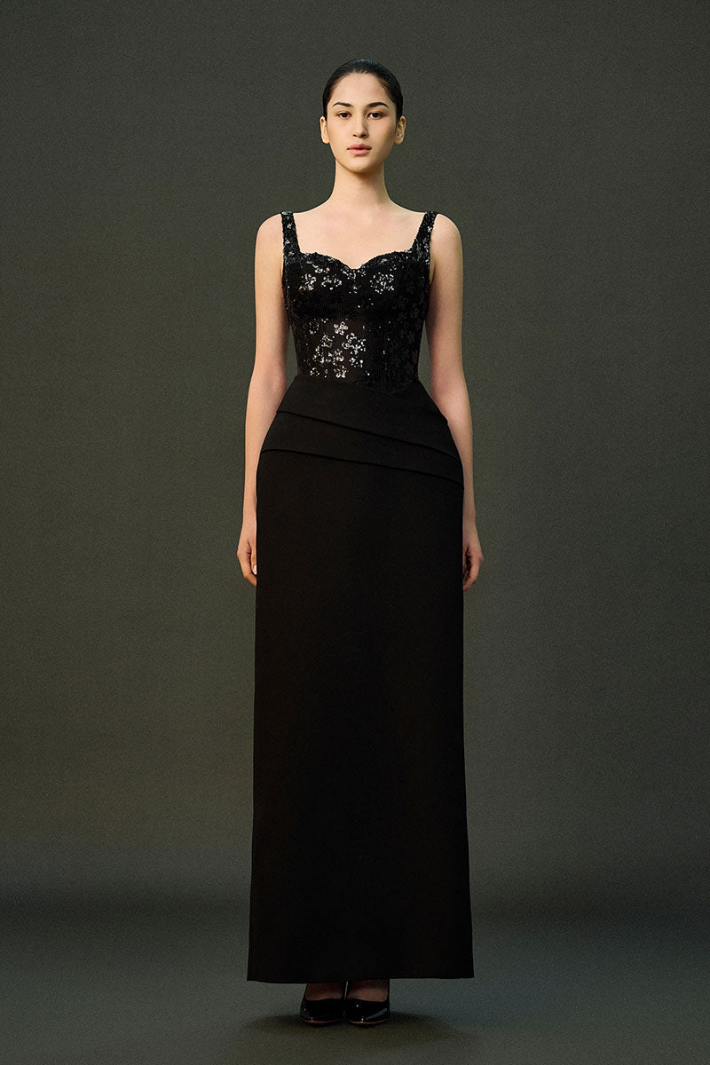 Black ESME gown by EEGEN STUDIO, featuring elegant design and flowing fabric, perfect for formal occasions.