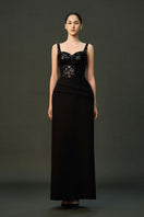 Black ESME gown by EEGEN STUDIO, featuring elegant design and flowing fabric, perfect for formal occasions.