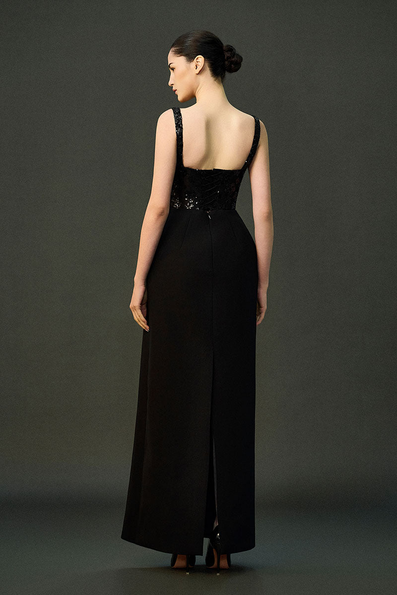Black ESME gown by EEGEN STUDIO featuring elegant fabric and a flowing silhouette, perfect for formal occasions.
