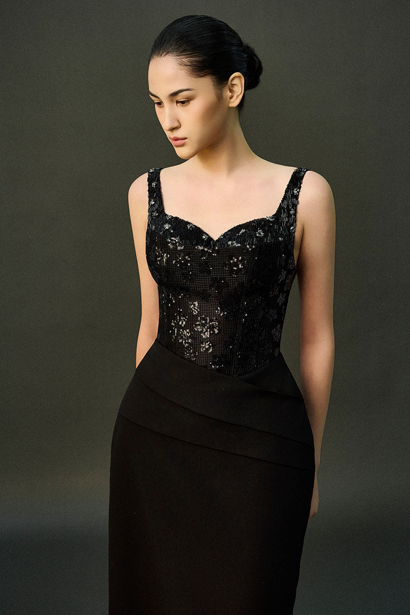 Black ESME gown by EEGEN STUDIO, featuring elegant fabric and a stylish design, perfect for formal occasions.