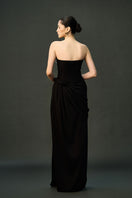 Black AZRA gown by EEGEN STUDIO featuring elegant fabric and a flowing silhouette, perfect for formal occasions.