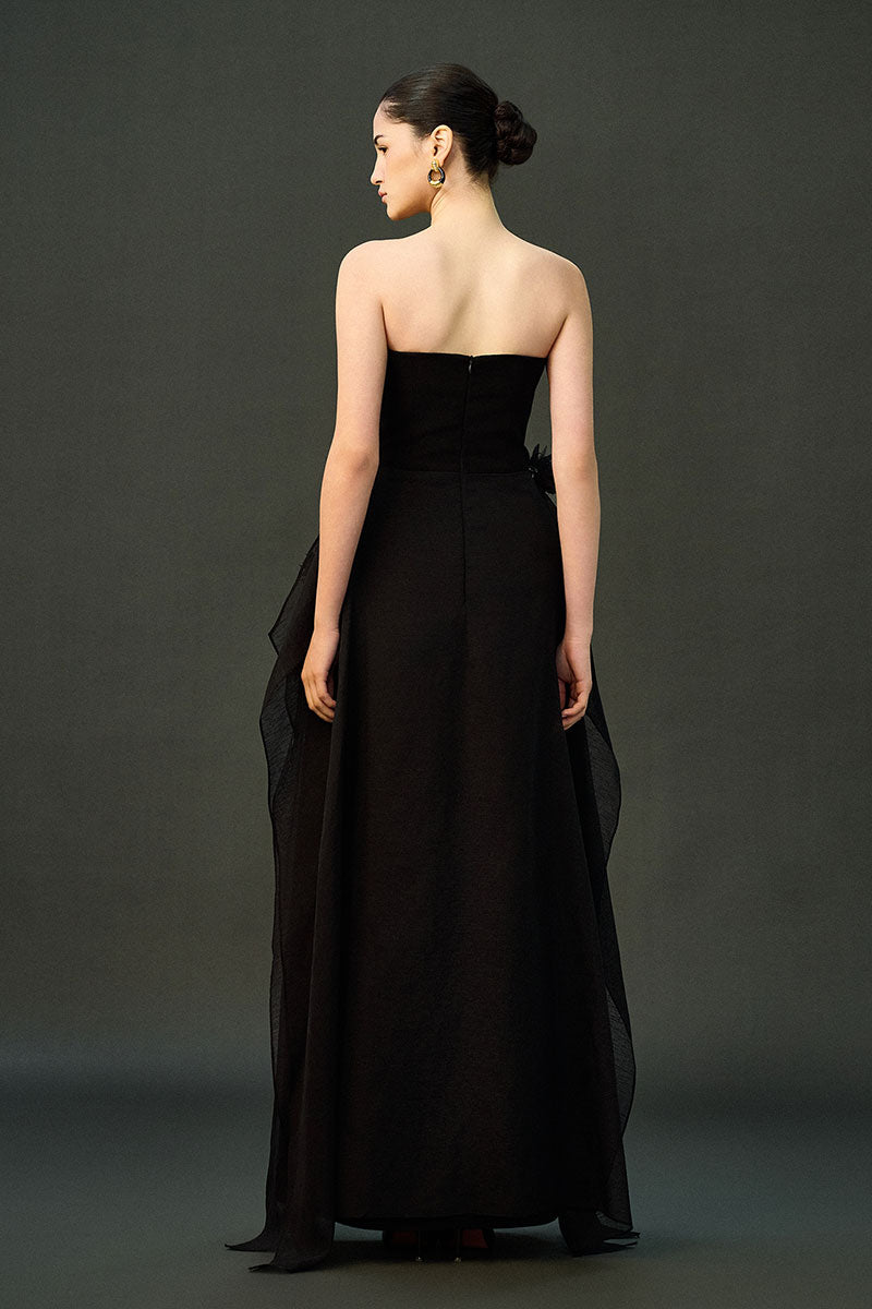 Black shale gown by EEGEN STUDIO featuring elegant design and flowing fabric, perfect for formal occasions.