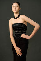 Black ADA gown by EEGEN STUDIO featuring elegant fabric and a flowing design, perfect for formal occasions.