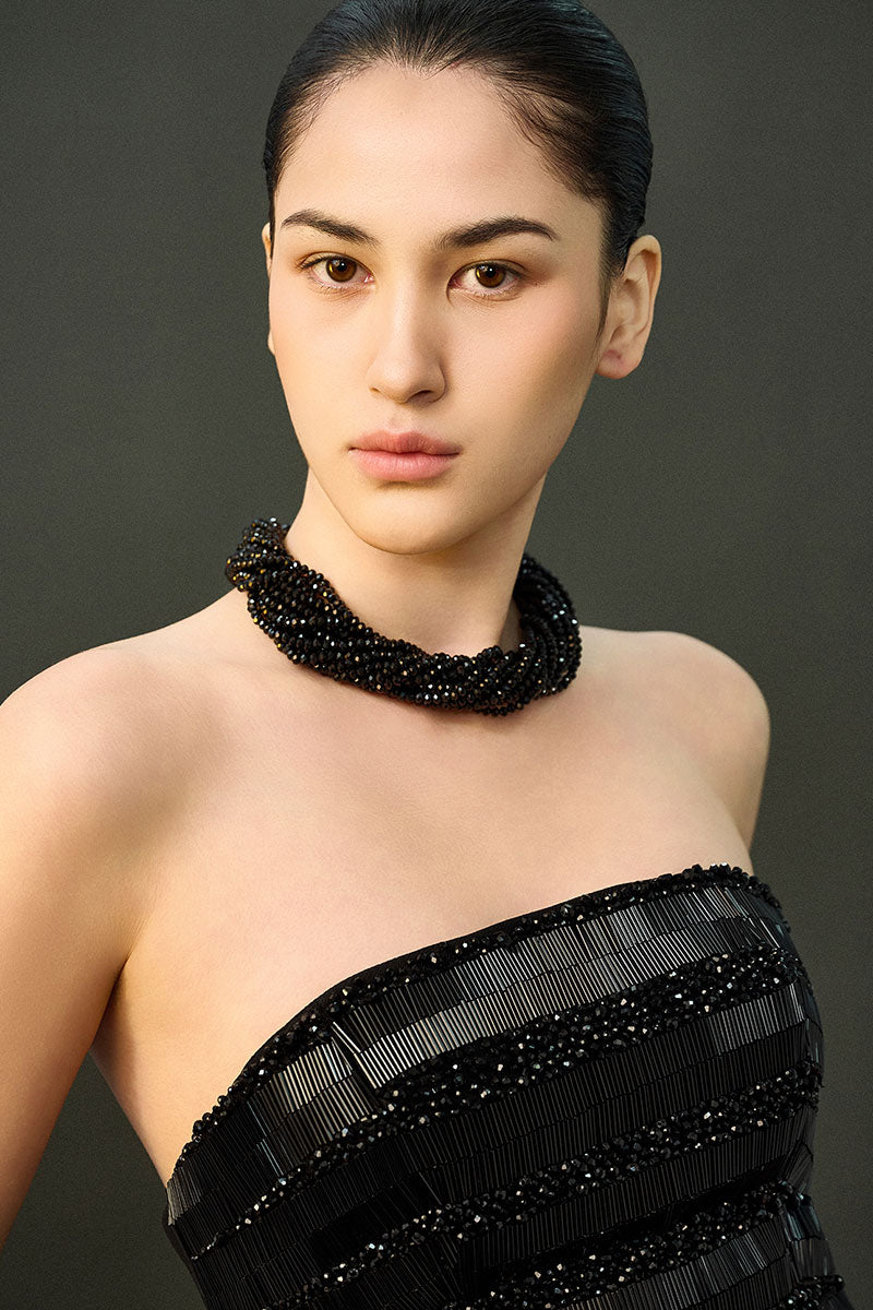 Black ADA dress gown by EEGEN STUDIO, featuring elegant fabric and detailed design, perfect for formal occasions.