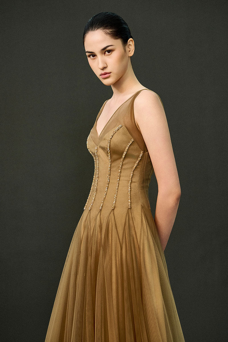 Caramel brown Samara gown by EEGEN STUDIO, flowing fabric with elegant design, showcased in a full-length view.