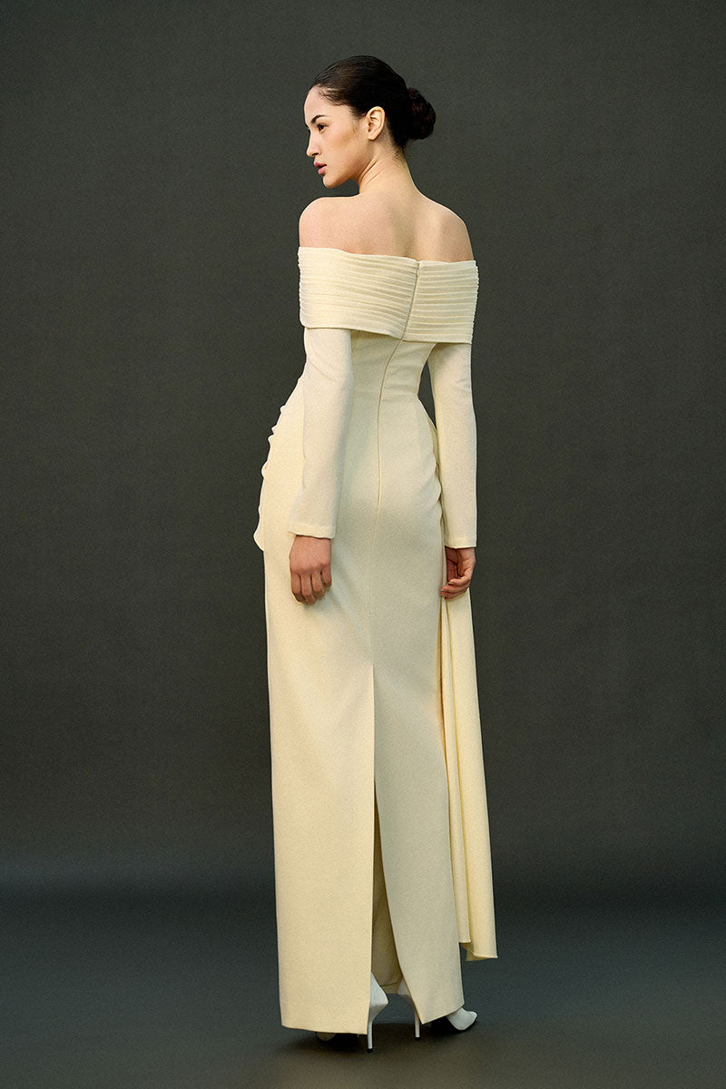 Off-white Amira gown by EEGEN Studio featuring elegant fabric and detailed design, perfect for formal occasions.