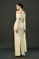 Off-white Amira gown by EEGEN Studio featuring elegant fabric and detailed design, perfect for formal occasions.