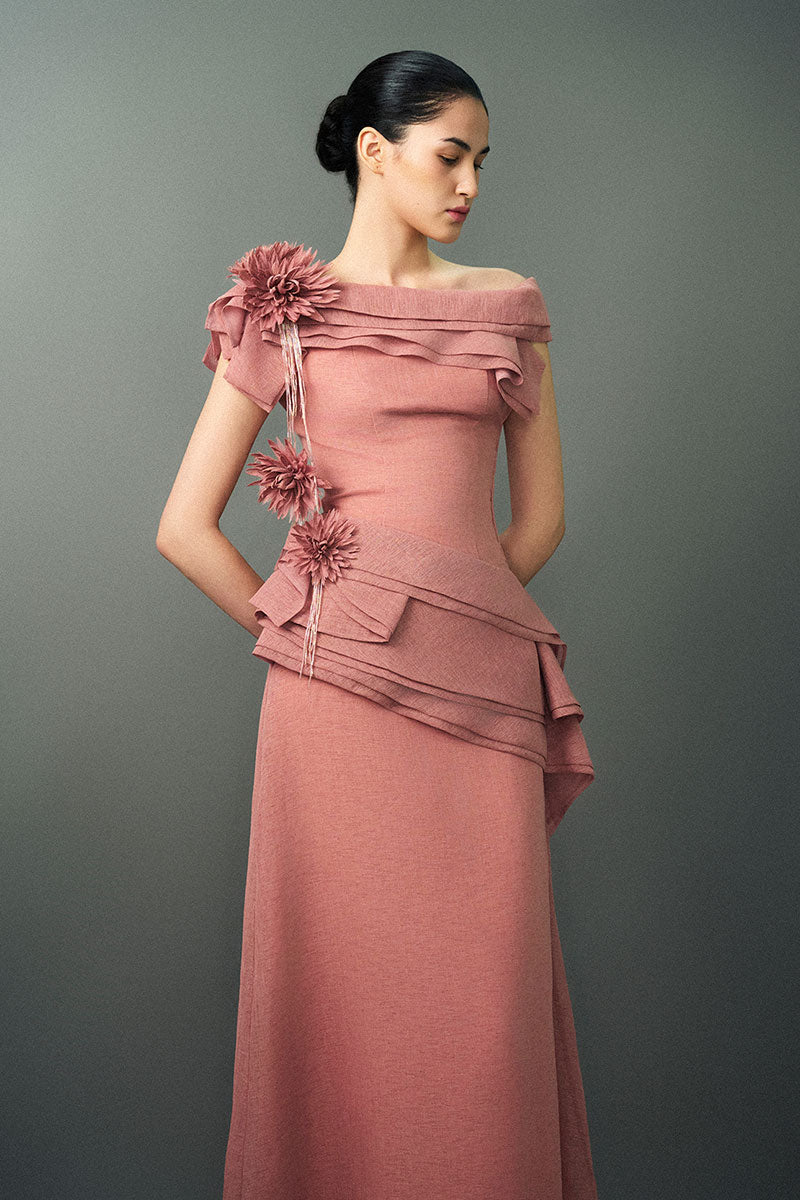 Pink RANYA gown by EEGEN STUDIO with flowing fabric and elegant design, showcased in a close-up image.