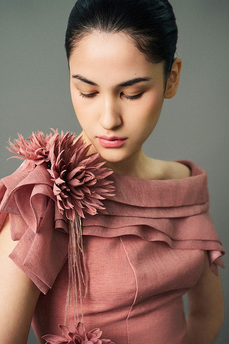 Pink RANYA gown by EEGEN STUDIO with elegant fabric and detailed design, showcased on a mannequin.