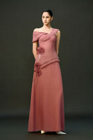 Pink Cyra gown by EEGEN STUDIO featuring elegant fabric and detailed design, displayed on a mannequin.