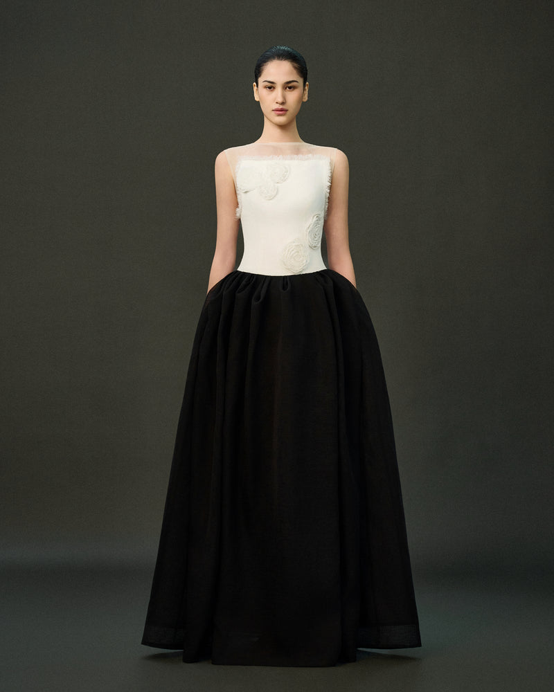 Black LINNEA gown by EEGEN STUDIO displayed on a model, featuring elegant fabric and classic design.