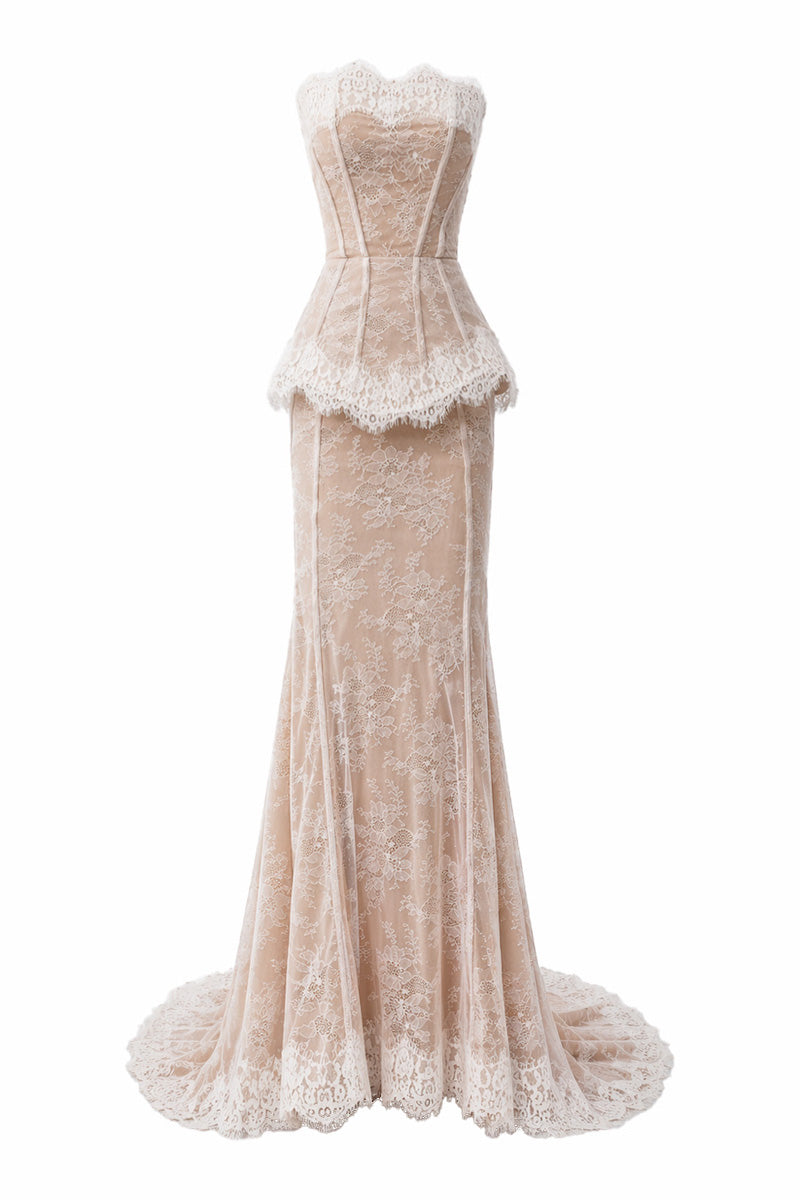 Elegant lace gown by Gigii's featuring a fitted silhouette and delicate detailing, perfect for formal occasions.