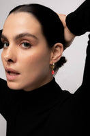 Lavani Jewels Sadie Red Earrings, stylish dangle earrings with vibrant red stones and intricate metalwork design.