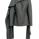 Gray safety top by YASSMIN SALEH, showcasing a cozy wool fabric and a comfortable, secure fit.