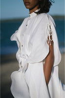 Off-white Saona beach cover-up by ANA + MARIA, lightweight and flowy with a relaxed fit for beach and resort wear.